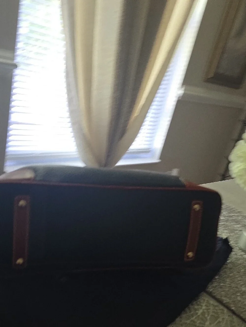 Dooney & Bourke Black Pebble Leather Messenger Bag with Brown Trim